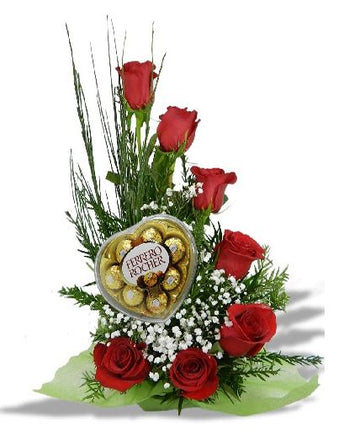 Arreglo suri con 7 rosas y caja de chocolates