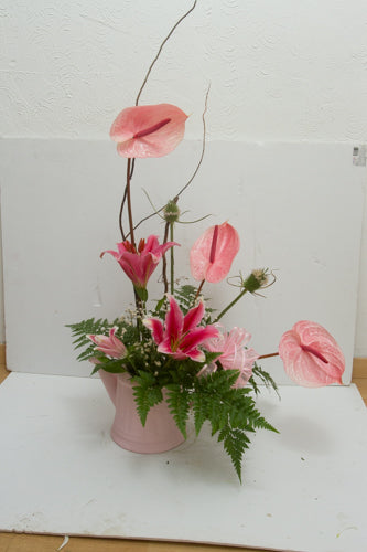 Irresistible arreglo de anturios y acapulcos